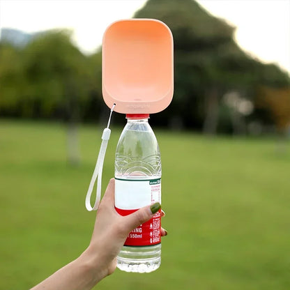 Dog Travel Water Bottle that fits most single serve water bottles.